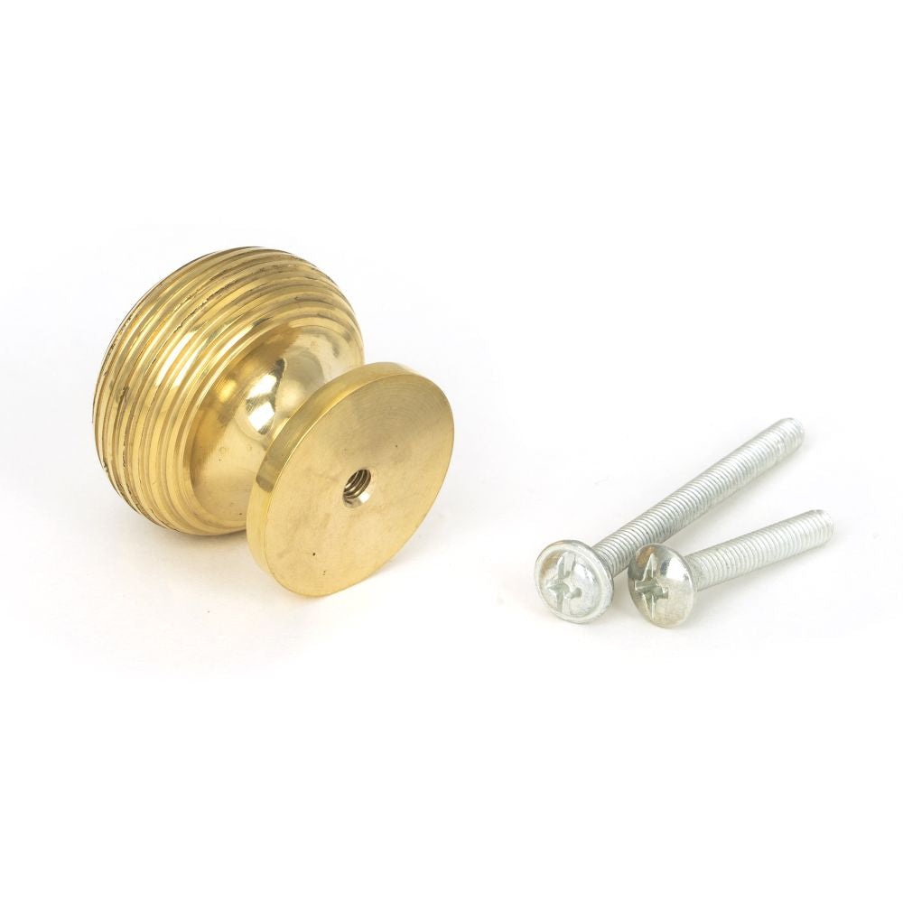 This is an image showing From The Anvil - Polished Brass Beehive Cabinet Knob 30mm available from trade door handles, quick delivery and discounted prices