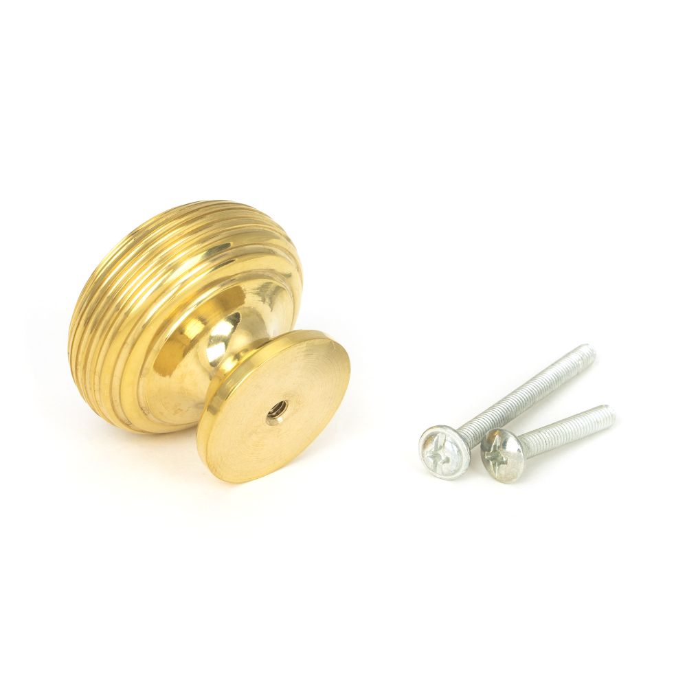 This is an image showing From The Anvil - Polished Brass Beehive Cabinet Knob 40mm available from trade door handles, quick delivery and discounted prices