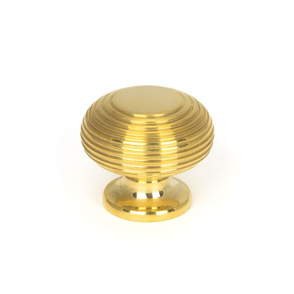 This is an image showing From The Anvil - Polished Brass Beehive Cabinet Knob 40mm available from trade door handles, quick delivery and discounted prices