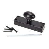 This is an image showing From The Anvil - Black knob for Cremone Bolt available from trade door handles, quick delivery and discounted prices