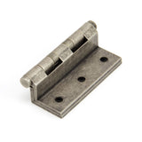 This is an image showing From The Anvil - Antique Pewter 2 1/2" Stormproof Hinge 1951 (pair) available from trade door handles, quick delivery and discounted prices