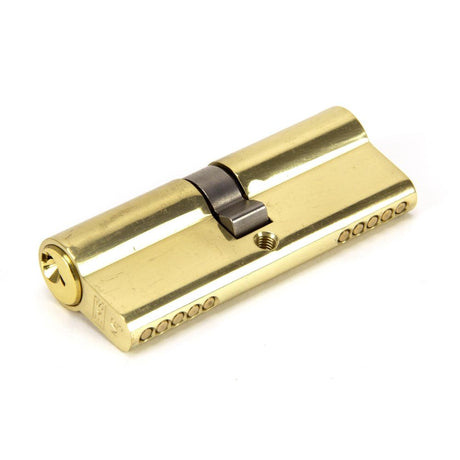 This is an image showing From The Anvil - Lacquered Brass 40/40 Euro Cylinder available from trade door handles, quick delivery and discounted prices