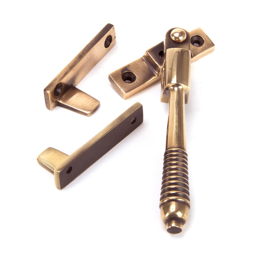 This is an image showing From The Anvil - Polished Bronze Night-Vent Locking Reeded Fastener available from trade door handles, quick delivery and discounted prices