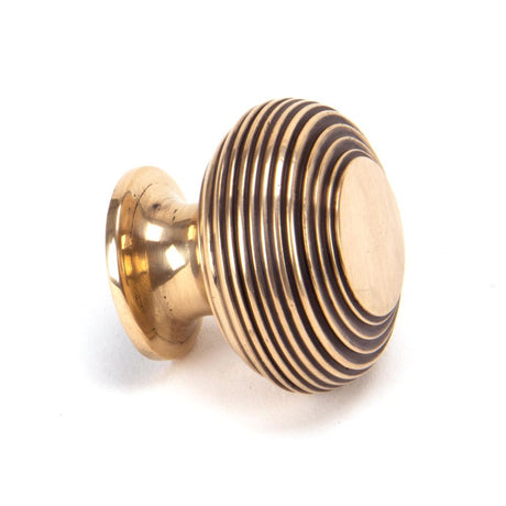 This is an image showing From The Anvil - Polished Bronze Beehive Cabinet Knob 40mm available from trade door handles, quick delivery and discounted prices