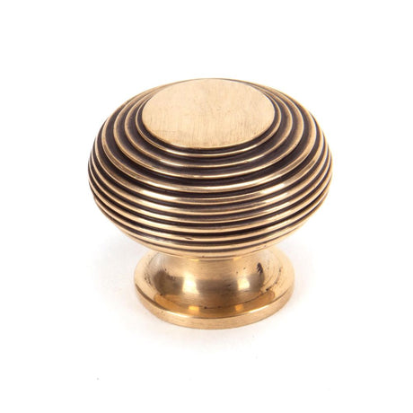This is an image showing From The Anvil - Polished Bronze Beehive Cabinet Knob 40mm available from trade door handles, quick delivery and discounted prices