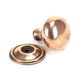 This is an image showing From The Anvil - Polished Bronze Mushroom Cabinet Knob 38mm available from trade door handles, quick delivery and discounted prices