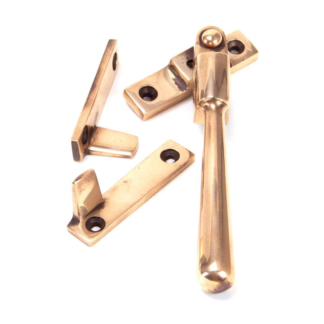 This is an image showing From The Anvil - Polished Bronze Night-Vent Locking Newbury Fastener available from trade door handles, quick delivery and discounted prices