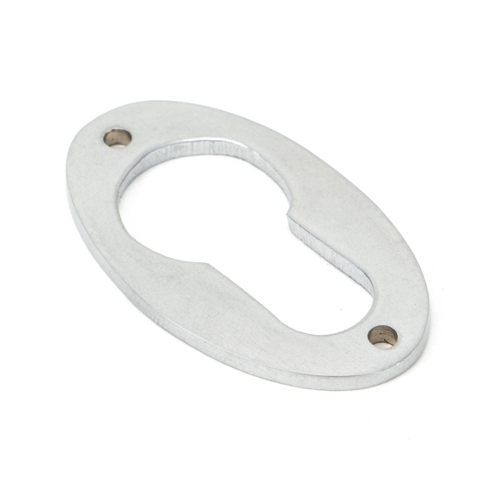 This is an image showing From The Anvil - Satin Chrome Oval Euro Escutcheon available from trade door handles, quick delivery and discounted prices