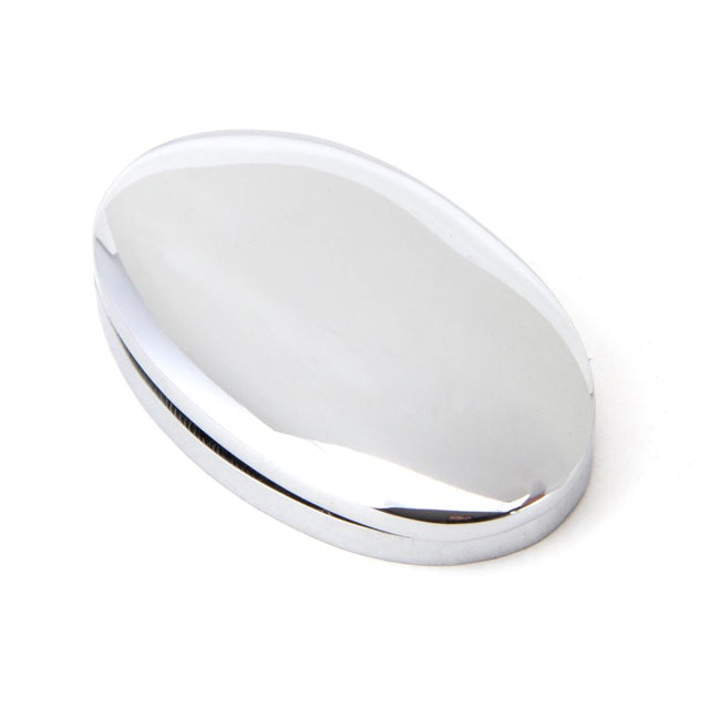 This is an image showing From The Anvil - Polished Chrome Oval Escutcheon & Cover available from trade door handles, quick delivery and discounted prices