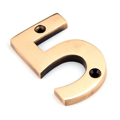 This is an image showing From The Anvil - Polished Bronze Numeral 5 available from trade door handles, quick delivery and discounted prices