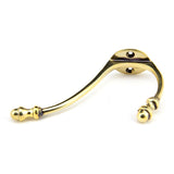 This is an image showing From The Anvil - Aged Brass Hat & Coat Hook available from trade door handles, quick delivery and discounted prices