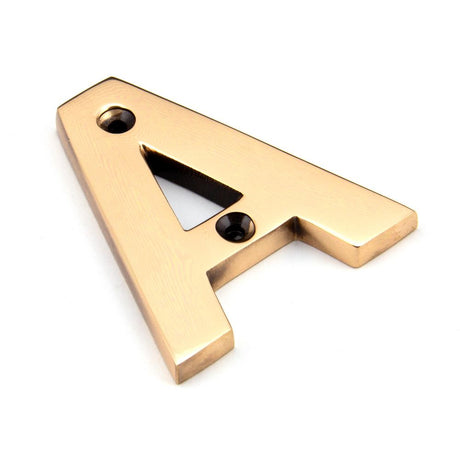 This is an image showing From The Anvil - Polished Bronze Letter A available from trade door handles, quick delivery and discounted prices