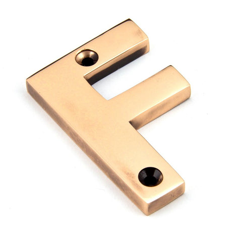 This is an image showing From The Anvil - Polished Bronze Letter F available from trade door handles, quick delivery and discounted prices