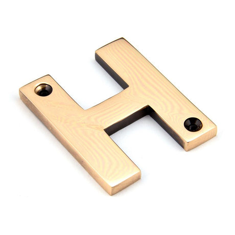 This is an image showing From The Anvil - Polished Bronze Letter H available from trade door handles, quick delivery and discounted prices