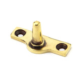This is an image showing From The Anvil - Aged Brass Offset Stay Pin available from trade door handles, quick delivery and discounted prices