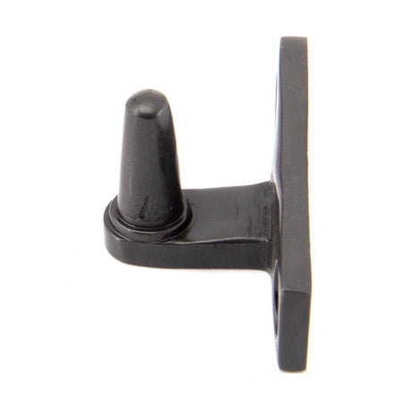 This is an image showing From The Anvil - Aged Bronze Cranked Stay Pin available from trade door handles, quick delivery and discounted prices