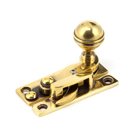 This is an image showing From The Anvil - Aged Brass Prestbury Sash Hook Fastener available from trade door handles, quick delivery and discounted prices