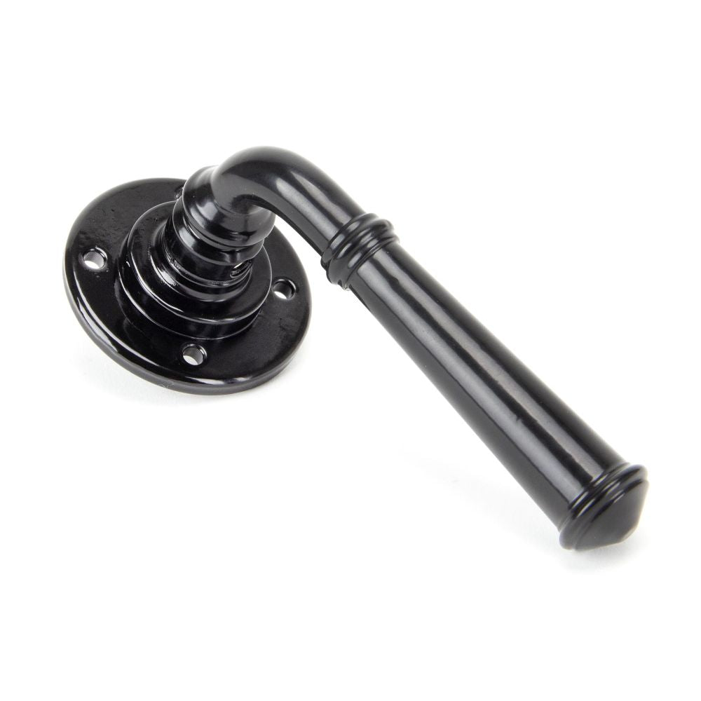 This is an image showing From The Anvil - Black Regency Lever on Rose Set available from trade door handles, quick delivery and discounted prices