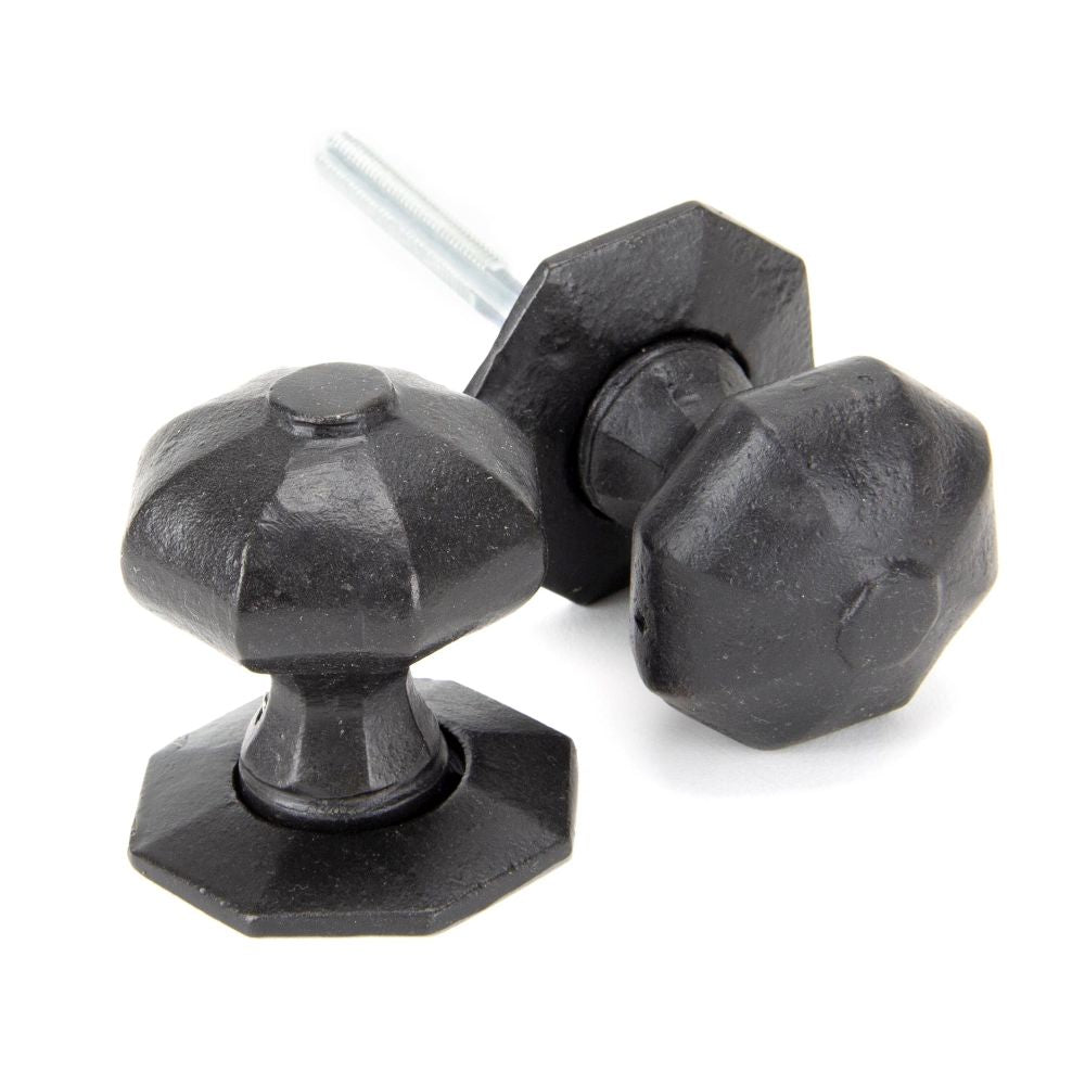 This is an image showing From The Anvil - External Beeswax Octagonal Mortice/Rim Knob Set available from trade door handles, quick delivery and discounted prices