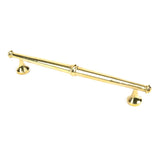 This is an image showing From The Anvil - Aged Brass Regency Pull Handle - Medium available from trade door handles, quick delivery and discounted prices