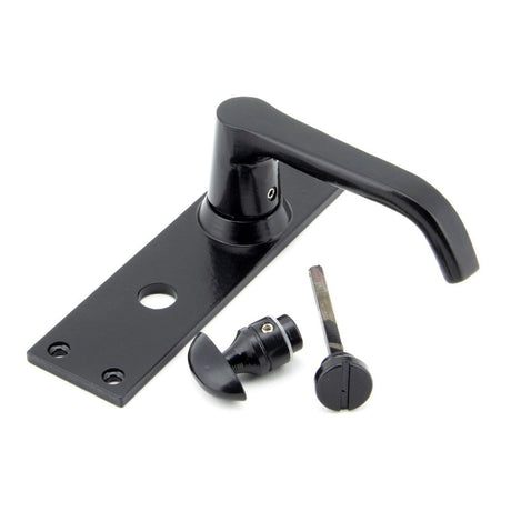 This is an image showing From The Anvil - Black Deluxe Lever Bathroom Set available from trade door handles, quick delivery and discounted prices