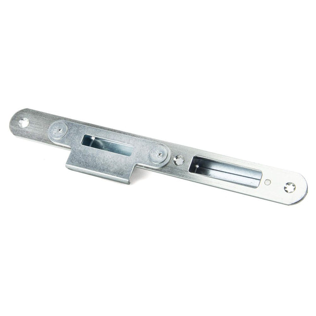 This is an image showing From The Anvil - BZP Winkhaus Centre Latch Keep RH 44mm Door available from trade door handles, quick delivery and discounted prices