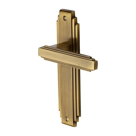 This is an image of a Heritage Brass - Door Handle Lever Latch Astoria Design Antique Brass Finish, ast5910-at that is available to order from Trade Door Handles in Kendal.