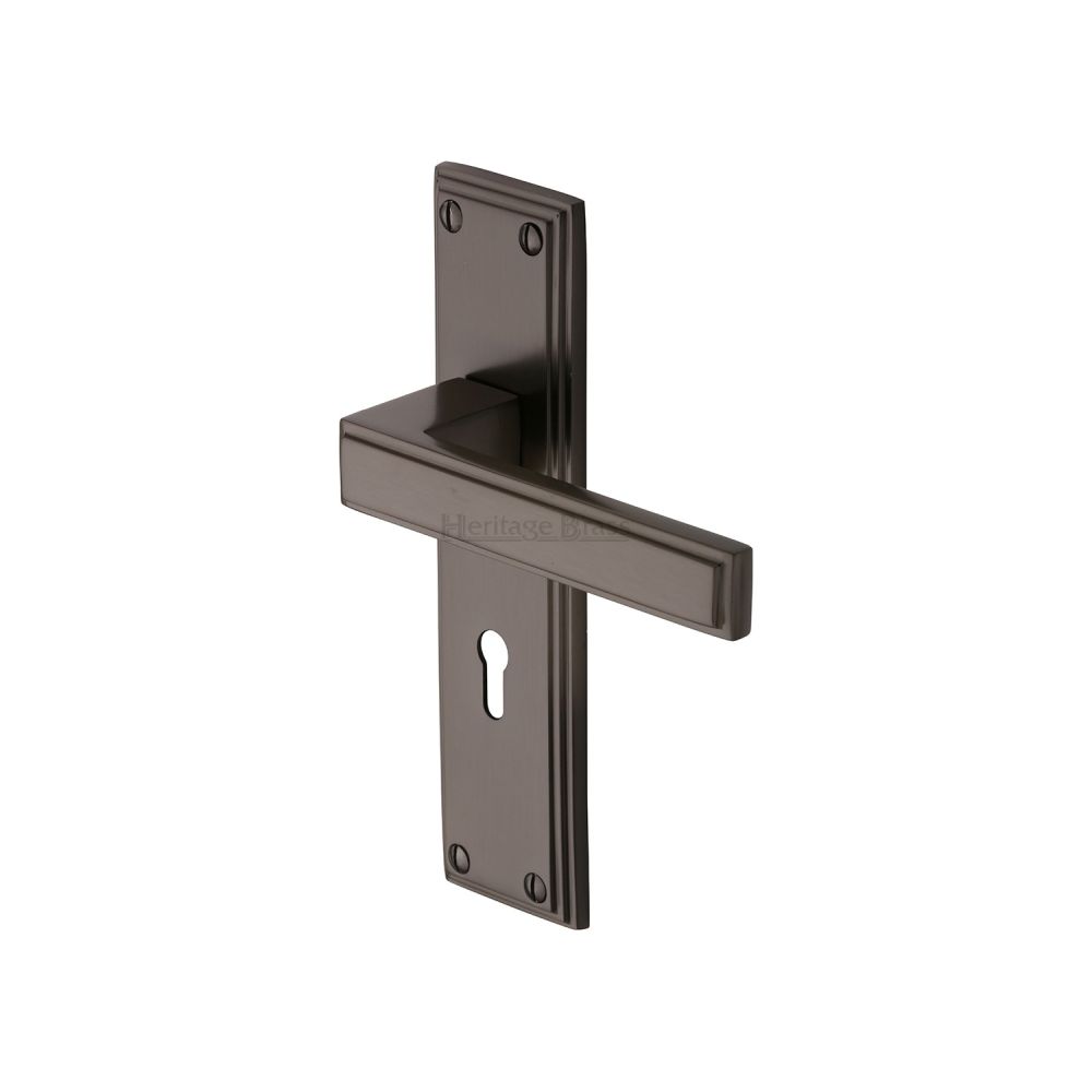 This is an image of a Heritage Brass - Door Handle Lever Lock Atlantis Design Matt Bronze Finish, atl5700-mb that is available to order from Trade Door Handles in Kendal.