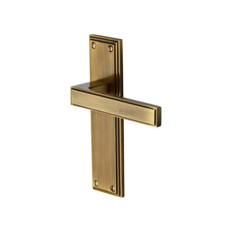 This is an image of a Heritage Brass - Door Handle Lever Latch Atlantis Design Antique Brass Finish, atl5710-at that is available to order from Trade Door Handles in Kendal.