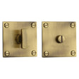 This is an image of a Heritage Brass - Square Low profile Thumbturn & Emergency Release Antique Brass Fin, bau1555-at that is available to order from Trade Door Handles in Kendal.