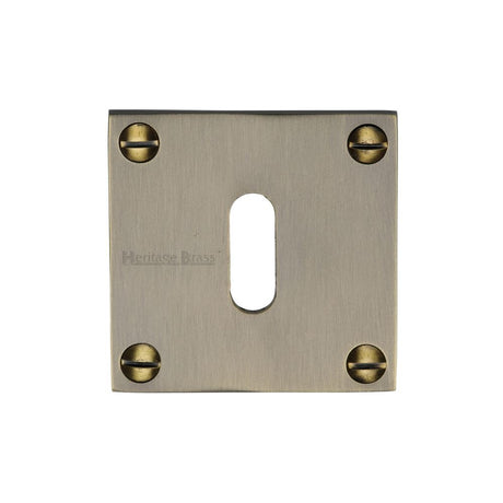 This is an image of a Heritage Brass - Keyhole Escutcheon Antique Brass Finish, bau1556-at that is available to order from Trade Door Handles in Kendal.