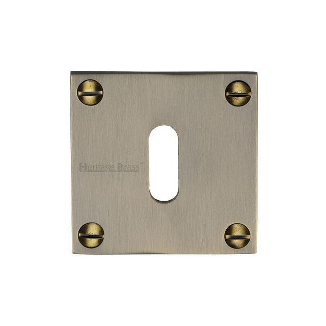 This is an image of a Heritage Brass - Keyhole Escutcheon Antique Brass Finish, bau1556-at that is available to order from Trade Door Handles in Kendal.