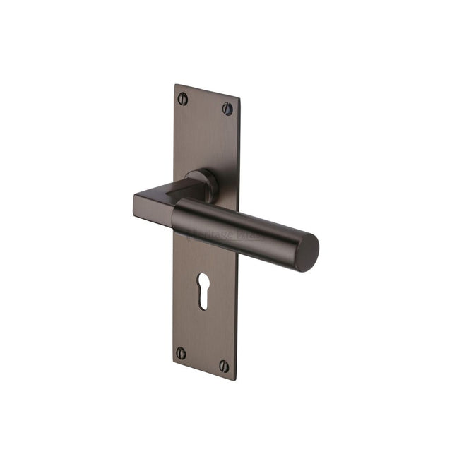 This is an image of a Heritage Brass - Door Handle Lever Lock Bauhaus Design Matt Bronze Finish, bau7300-mb that is available to order from Trade Door Handles in Kendal.