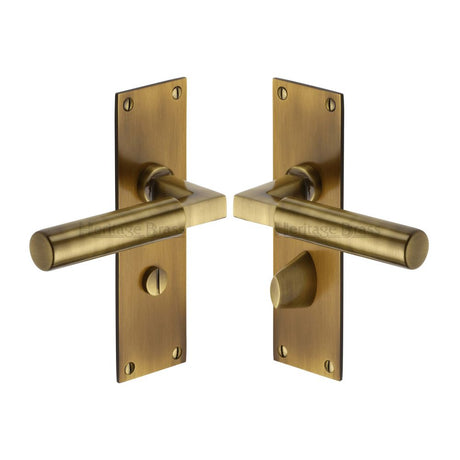 This is an image of a Heritage Brass - Door Handle for Bathroom Bauhaus Design Antique Brass Finish, bau7330-at that is available to order from Trade Door Handles in Kendal.