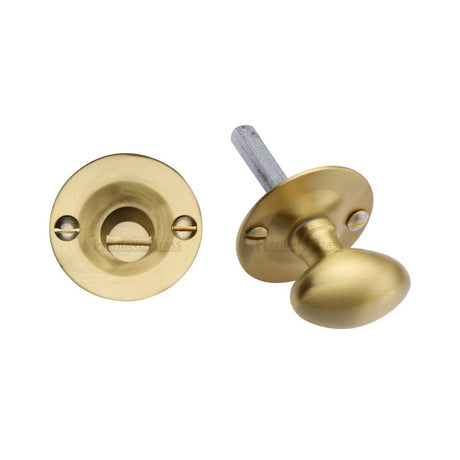 This is an image of a Heritage Brass - Oval turn with release Satin Brass Finish, bt15-sb that is available to order from Trade Door Handles in Kendal.