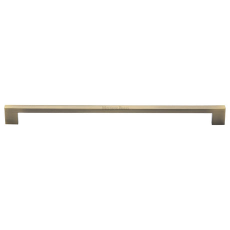 This is an image of a Heritage Brass - Cabinet Pull Metro Design 320mm CTC Antique Brass Finish, c0337-320-at that is available to order from Trade Door Handles in Kendal.