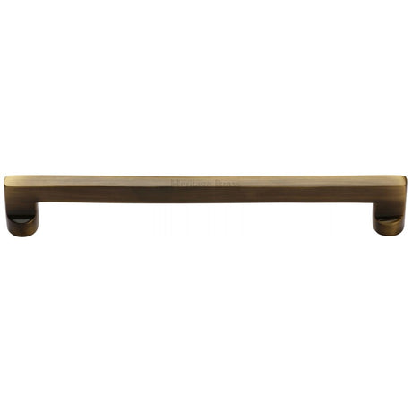 This is an image of a Heritage Brass - Cabinet Pull Apollo Design 203mm CTC Antique Brass Finish, c0345-203-at that is available to order from Trade Door Handles in Kendal.