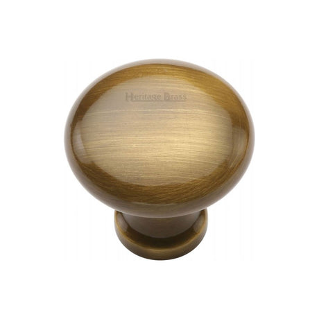 This is an image of a Heritage Brass - Cabinet Knob Victorian Round Design 32mm Antique Brass Finish, c113-32-at that is available to order from Trade Door Handles in Kendal.