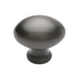 This is a image of a Heritage Brass - Cabinet Knob Victorian Oval Design 38mm Matt Bronze Finish that is available to order from Trade Door Handles in Kendal