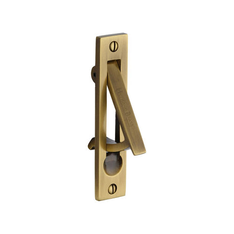 This is an image of a Heritage Brass - Pocket Door Edge Pull Antique Brass Finish, c1165-at that is available to order from Trade Door Handles in Kendal.