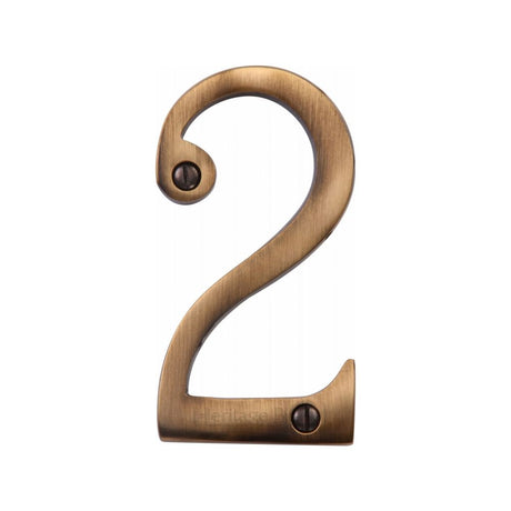 This is an image of a Heritage Brass - Numeral 2 Face Fix 76mm (3") Antique Brass Finish, c1560-2-at that is available to order from Trade Door Handles in Kendal.