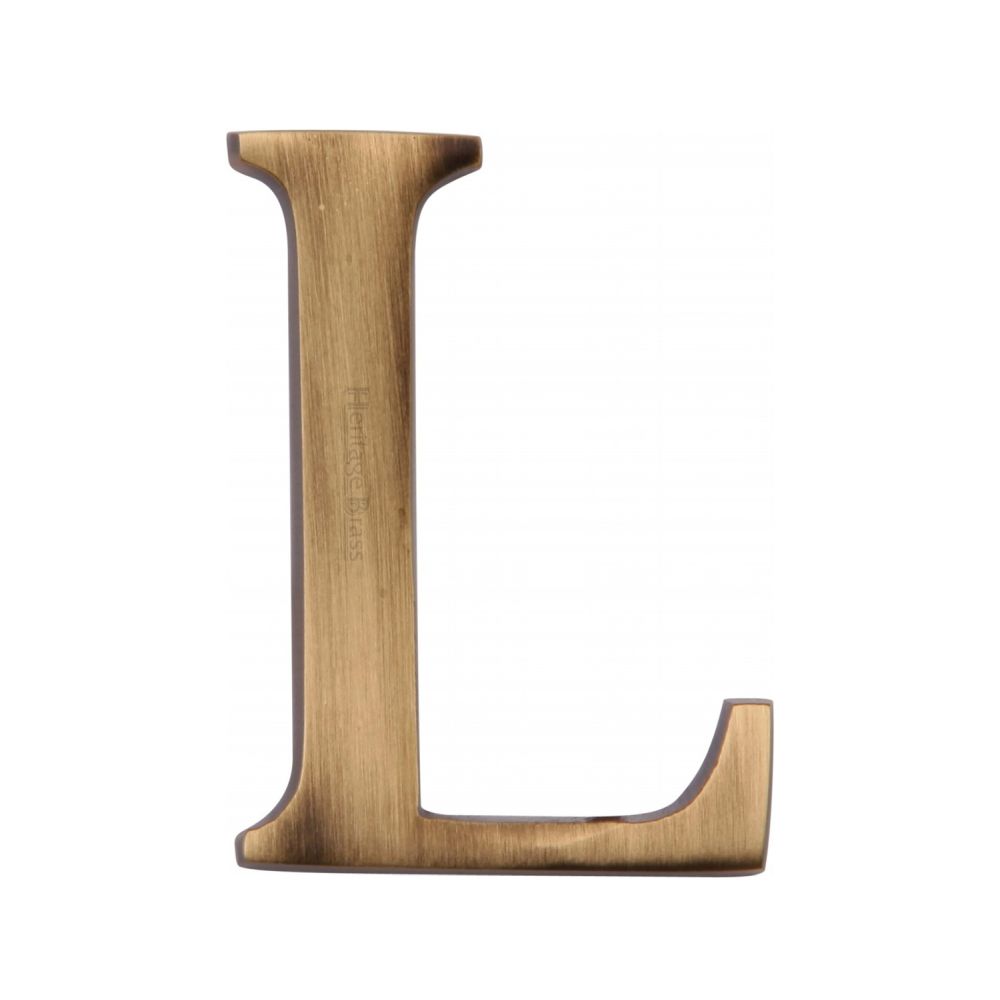 This is an image of a Heritage Brass - Alphabet L Pin Fix 51mm (2") Antique Brass Finish, c1565-2-l-at that is available to order from Trade Door Handles in Kendal.