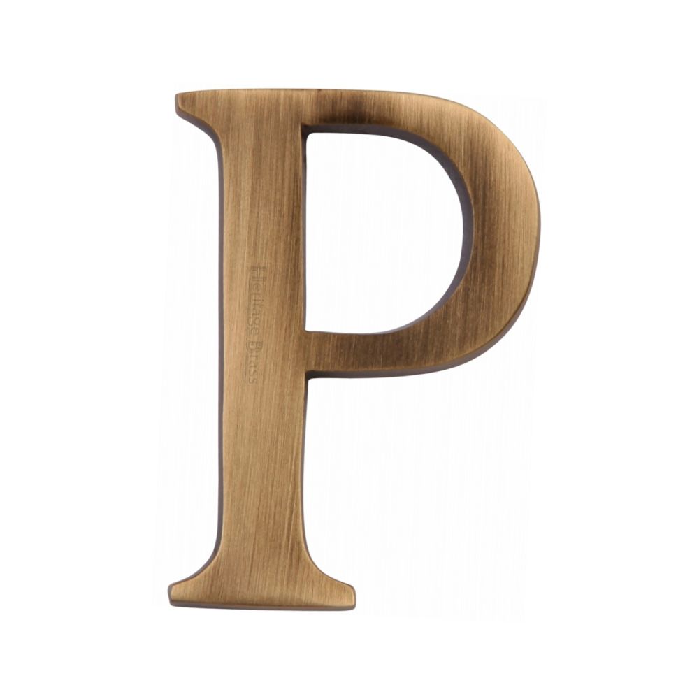 This is an image of a Heritage Brass - Alphabet P Pin Fix 51mm (2") Antique Brass Finish, c1565-2-p-at that is available to order from Trade Door Handles in Kendal.