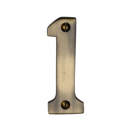 This is an image of a Heritage Brass - Numeral 1 Face Fix 76mm (3") Antique Brass Finish, c1566-1-at that is available to order from Trade Door Handles in Kendal.