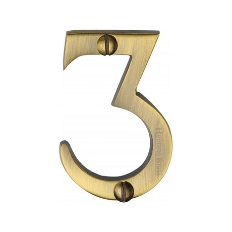 This is an image of a Heritage Brass - Numeral 3 Face Fix 51mm (2") Antique Brass Finish, c1567-3-at that is available to order from Trade Door Handles in Kendal.