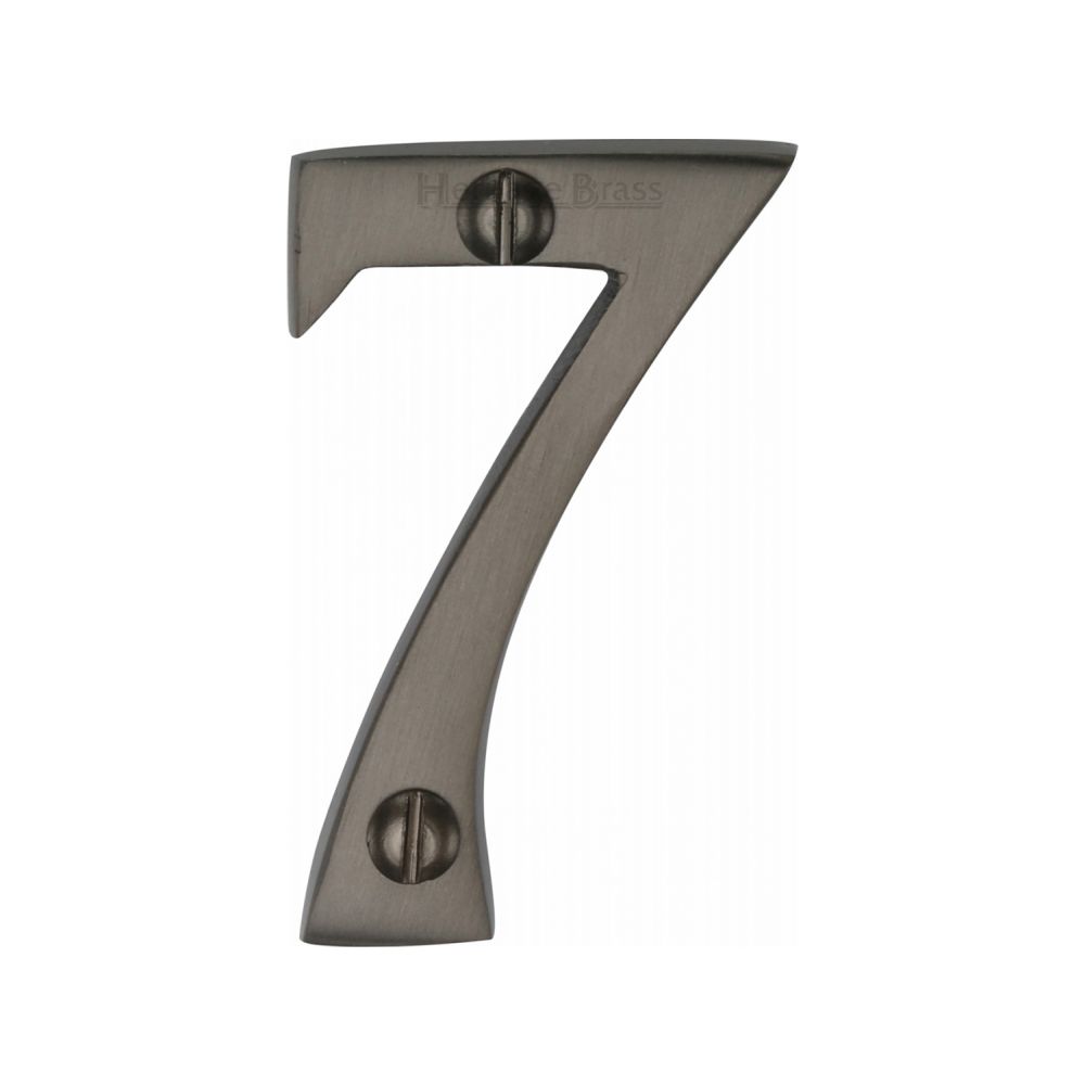 This is an image of a Heritage Brass - Numeral 7 Face Fix 51mm (2") Matt Bronze Finish, c1567-7-mb that is available to order from Trade Door Handles in Kendal.