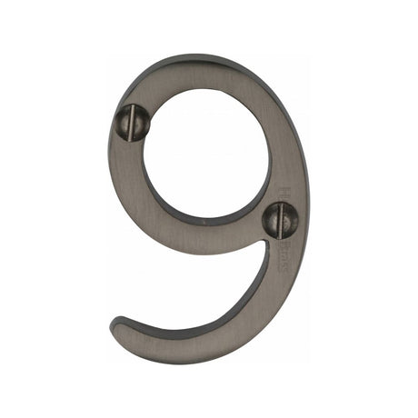 This is an image of a Heritage Brass - Numeral 9 Face Fix 51mm (2") Matt Bronze Finish, c1567-9-mb that is available to order from Trade Door Handles in Kendal.