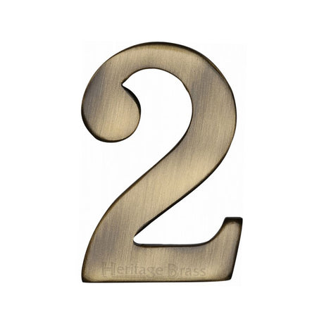 This is an image of a Heritage Brass - Numeral 2 Self Adhesive 51mm (2") Antique Brass Finish, c1568-2-at that is available to order from Trade Door Handles in Kendal.