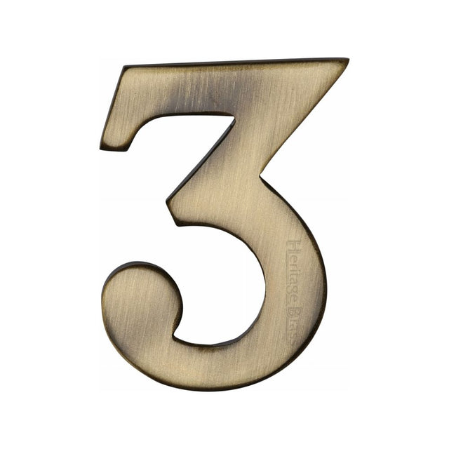 This is an image of a Heritage Brass - Numeral 3 Self Adhesive 51mm (2") Antique Brass Finish, c1568-3-at that is available to order from Trade Door Handles in Kendal.