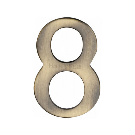 This is an image of a Heritage Brass - Numeral 8 Self Adhesive 51mm (2") Antique Brass Finish, c1568-8-at that is available to order from Trade Door Handles in Kendal.